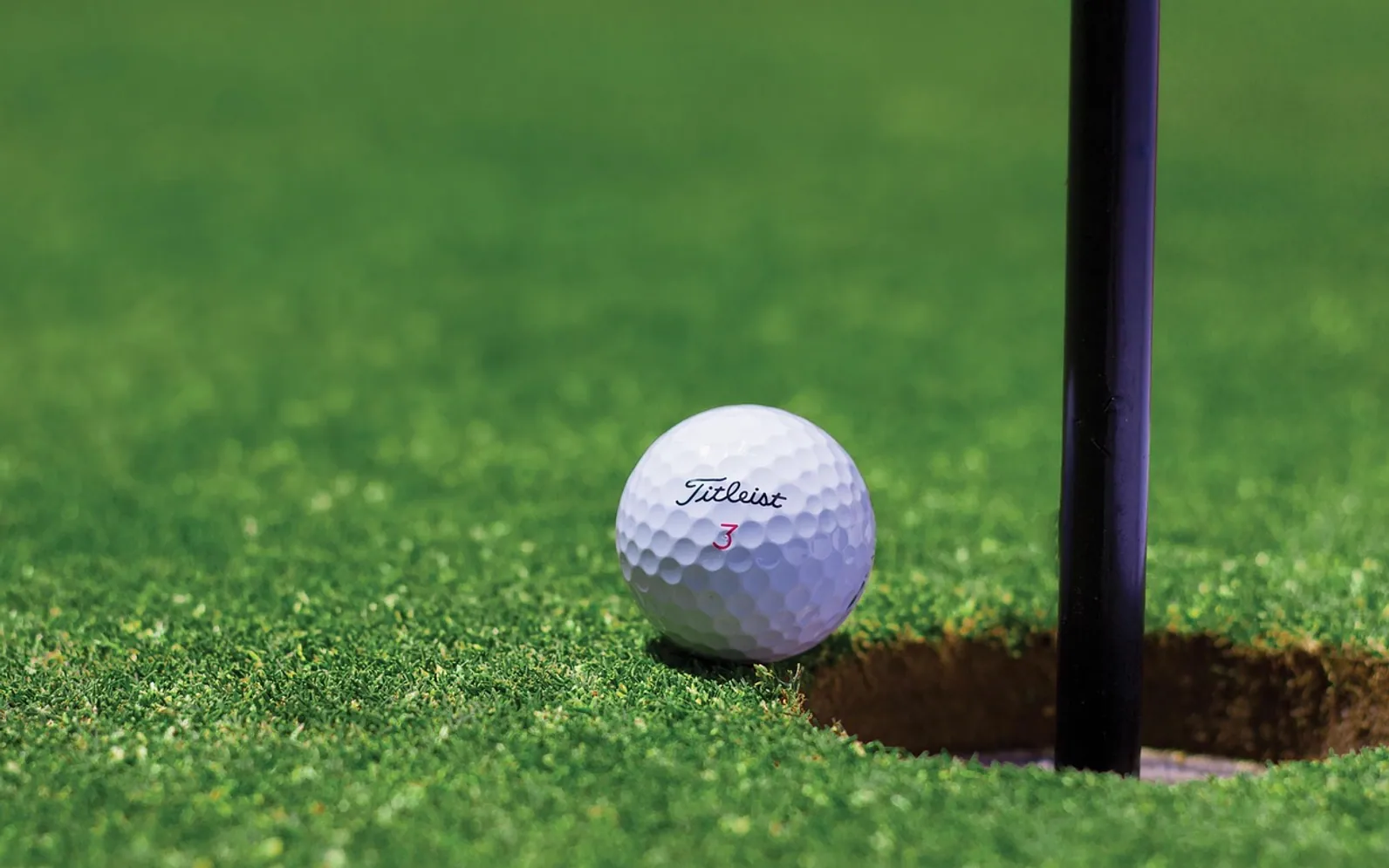 Golf, golf ball and hole